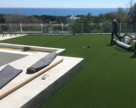 Grass being fitted at cabopino