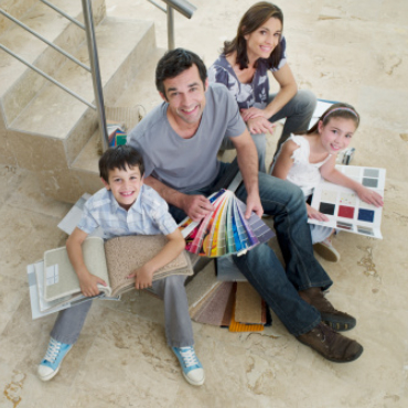Family choosing matching fabric, paint colour and carpet